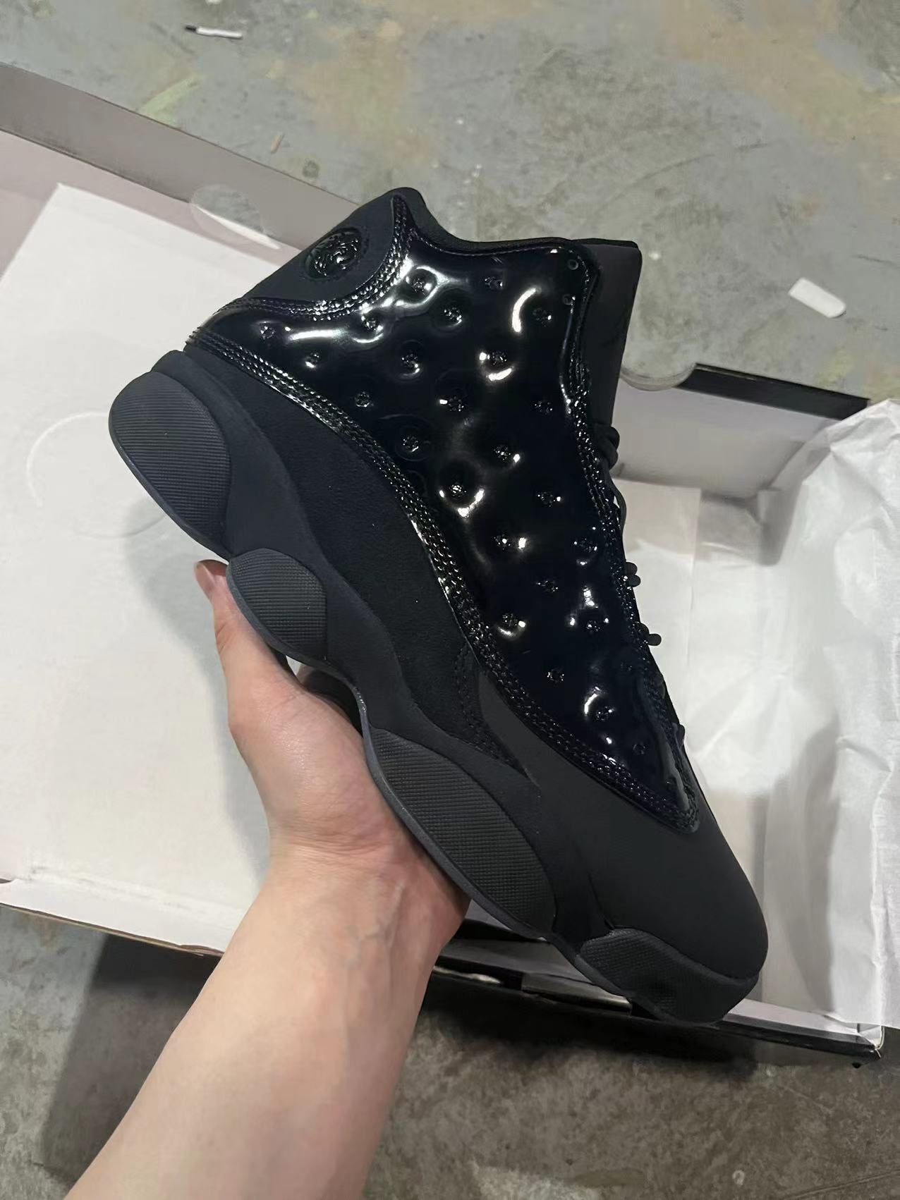 Air Jordan 13 “Cap and Gown” (Triple Black Patent)