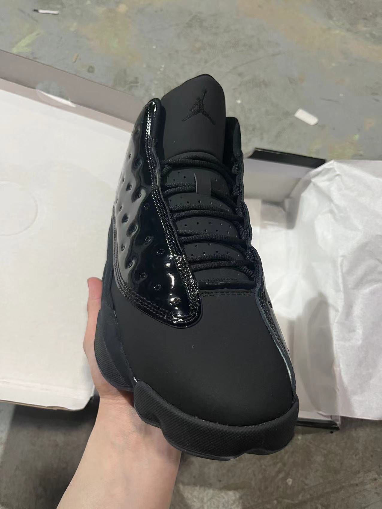 Air Jordan 13 “Cap and Gown” (Triple Black Patent)