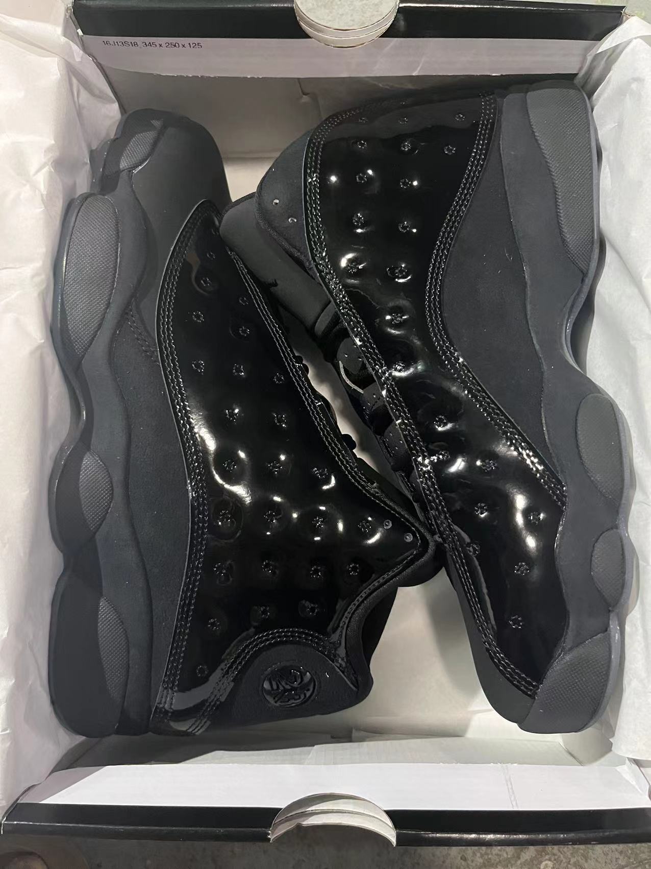 Air Jordan 13 “Cap and Gown” (Triple Black Patent)