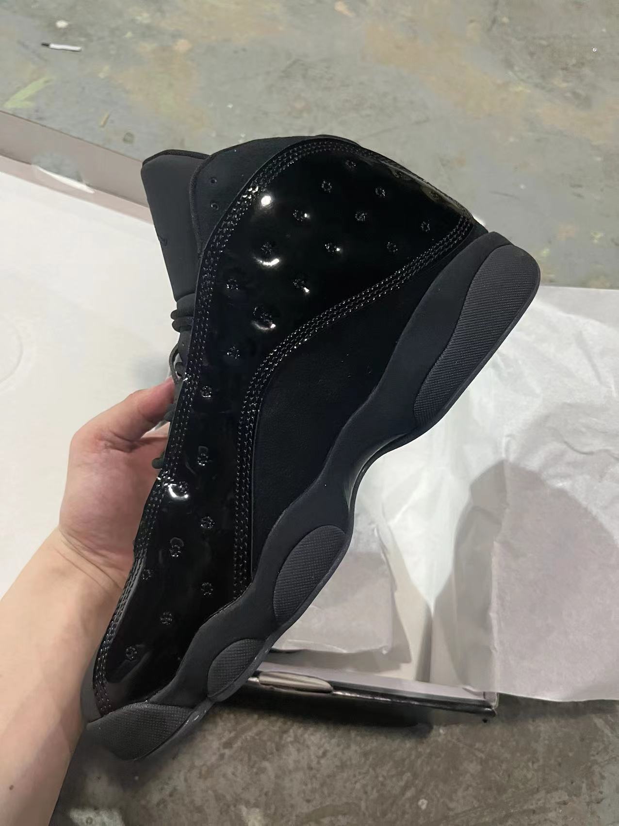 Air Jordan 13 “Cap and Gown” (Triple Black Patent)